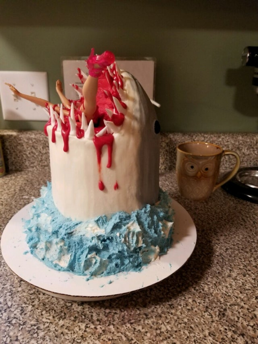 My nephew turned 6 a few days ago. He loves sharks a desperately wanted a cake that looked like a shark eating a person, so my sister made this.