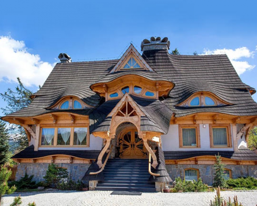 Look At The Roof And Front Door Of This House