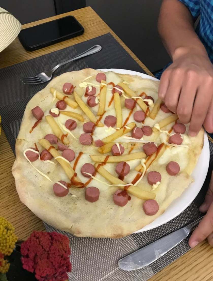 My brother got this pizza in Rome, Italy…