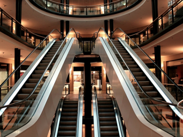 Where do you stand when going up an escalator?