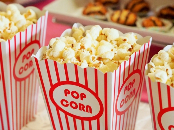 Do you prefer to go to the movies or watch a movie in?