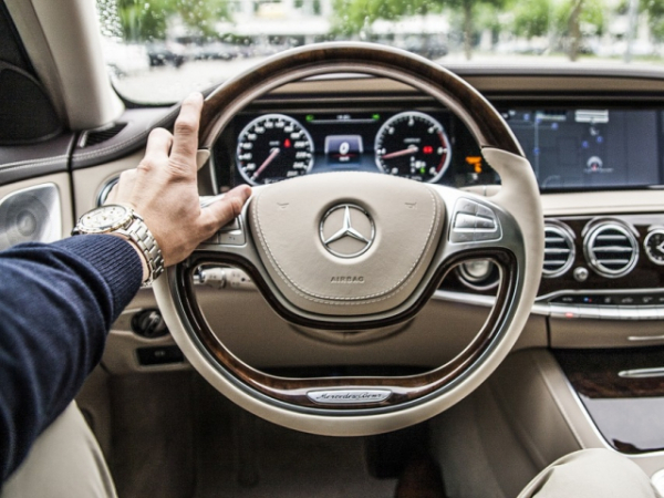 If you are borrowing a friend's car and you first climb in and look out the windshield, you can see the top ____% of the steering wheel.