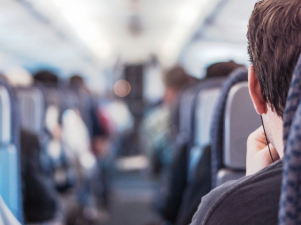 If you notice that someone is nervous in the airplane seat next to you, what do you do?