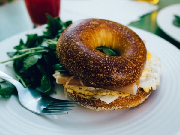 Do you bite into a bagel or eat each half separately?