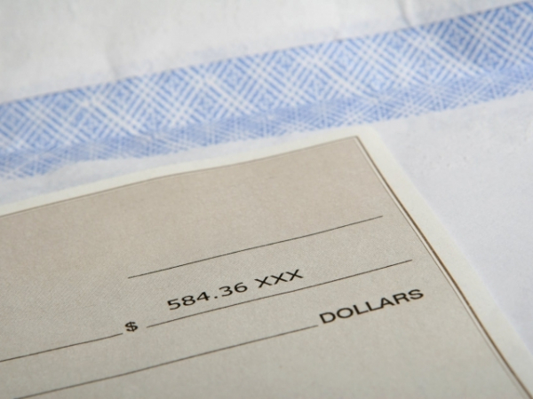 You find a check on the street that has been signed and dated for cash. It is worth $2,000. What do you do?