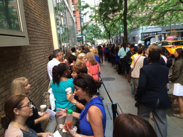 How do you stand when waiting in line or in one place?