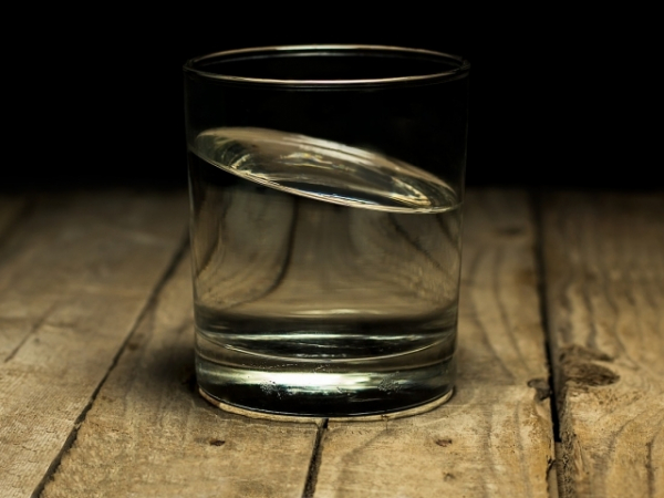 There's a glass in front of you with some liquid in it. How would you describe it?