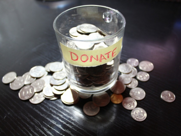 Do you donate loose change into the store collection bins?