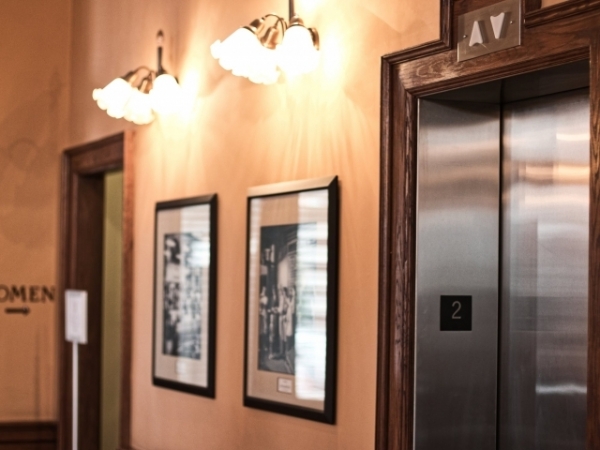 You're stuck in an elevator with an older lady. Do you make small talk?