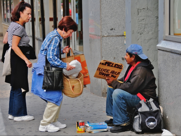 You see a homeless guy begging for loose change. What do you do?